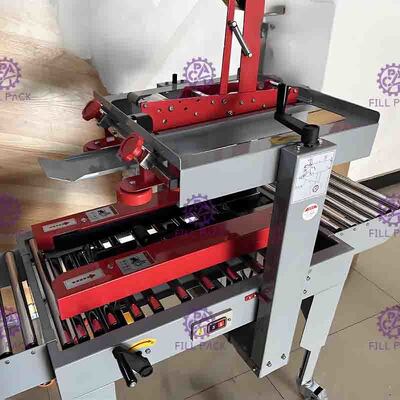 Máquina de empacotamento semi automática da garrafa da caixa da selagem da caixa